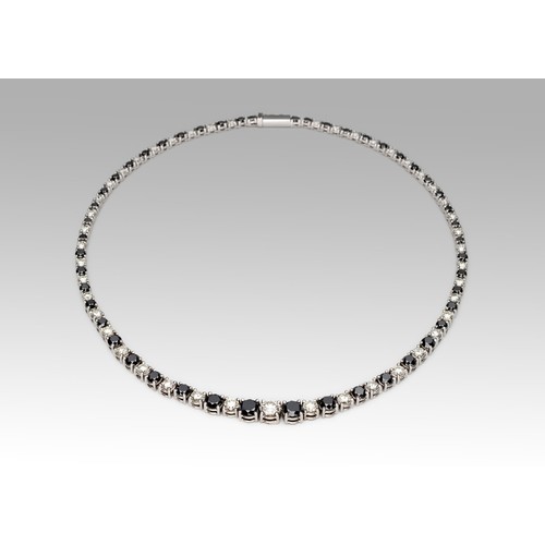 1033 - A BLACK AND WHITE DIAMOND SINGLE-LINE NECKLACE