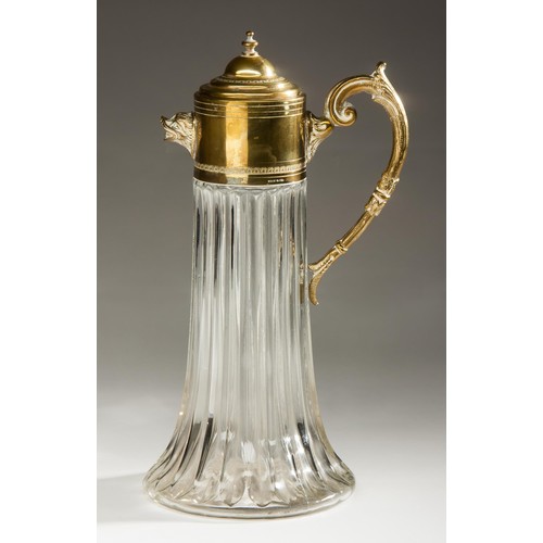 422 - AN ITALIAN BRASS MOUNTED GLASS CARAFE