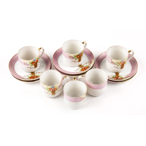 439 - A JAPANESE DEMITASSE SET, MID 20TH CENTURY