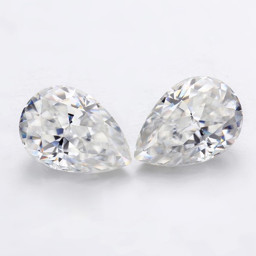 1131 - A PAIR OF TEARDROP BRILLIANT CUT DIAMONDS, 0.77 CARATS