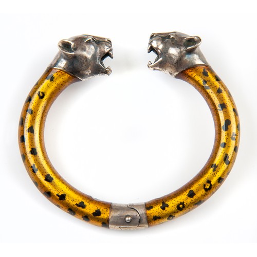 145 - A SILVER LEOPARD HEAD BANGLE