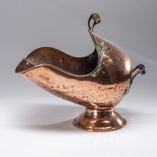 85 - A COPPER HELMET COAL SCUTTLE