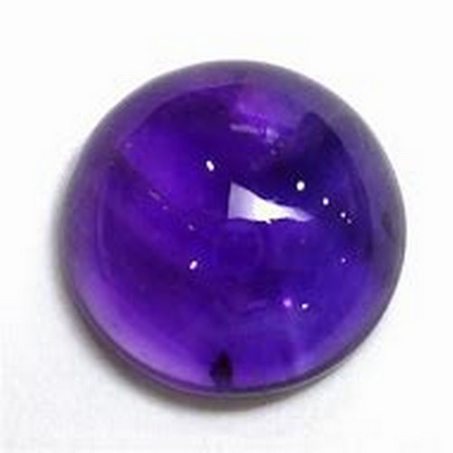 568 - A CABOCHON CUT AMETHYST