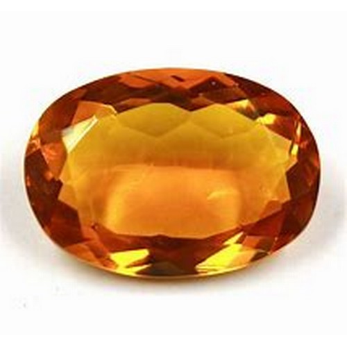 580 - AN OVAL CUT CITRINE