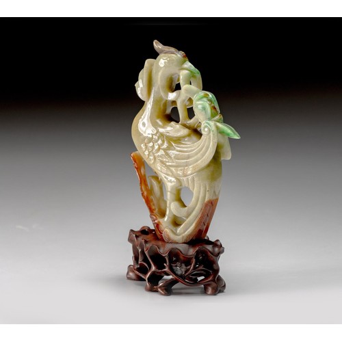 1107 - A CHINESE JADEITE FIGURE OF A PHOENIX, QING DYNASTY, LATE 19TH CENTURY