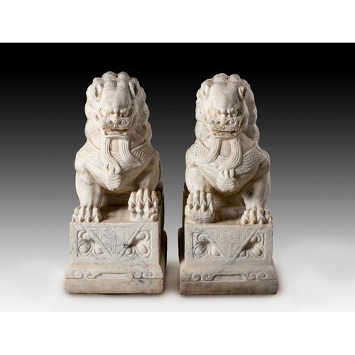 1082 - A PAIR OF CHINESE WHITE MARBLE FU-DOGS, PEOPLE'S REPUBLIC OF CHINA, 1949 -