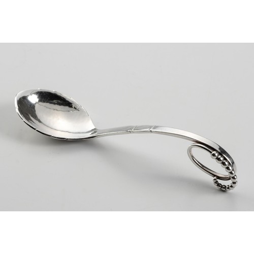 941 - A GEORG JENSEN SILVER ORNAMENTAL SERVERS PATTERN #41 SUGAR SPOON, RE ASSAY MARK FOR LONDON, 1947