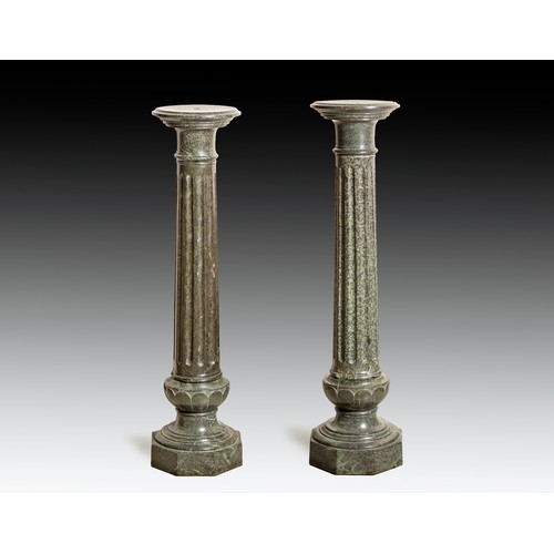 1054 - A PAIR OF GREEN SERPENTINE MARBLE PLINTHS