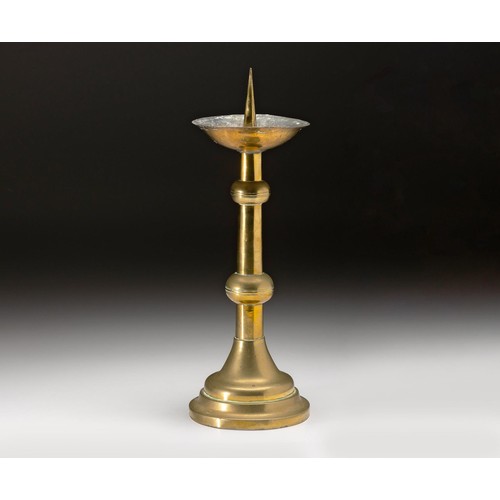 1061 - A BRASS ALTAR CANDLESTICK