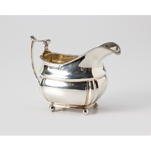 882 - AN EDWARD VII SILVER MILK JUG, JOHN ROUND AND SONS LTD, LONDON, 1903