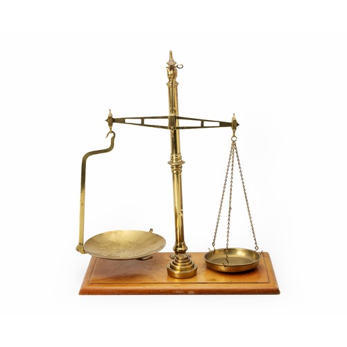 133 - A BRASS SCALE AND WEIGHTS