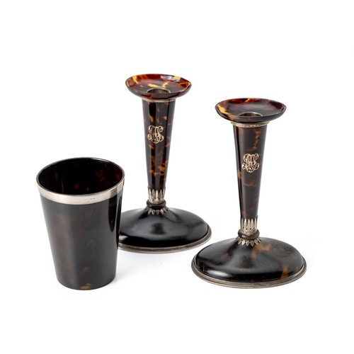 106 - A PAIR OF TORTOISESHELL SILVER MOUNTED AND PIQUE INLAID DRESSING TABLE CANDLESTICKS