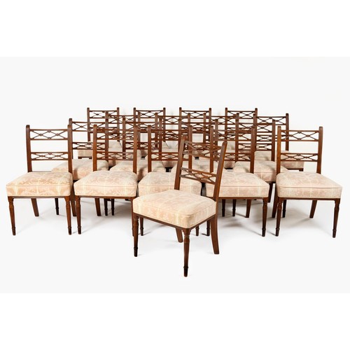 222 - A SET OF EIGHTEEN REGENCY STYLE WALNUT DINING CHAIRS