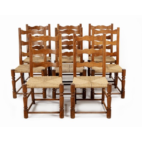 320 - A SET OF EIGHT OAK DINING CHAIRS, MANUFACTURED BY PIERRE CRONJE