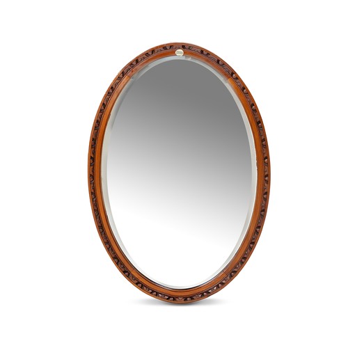 328 - A WALNUT MIRROR