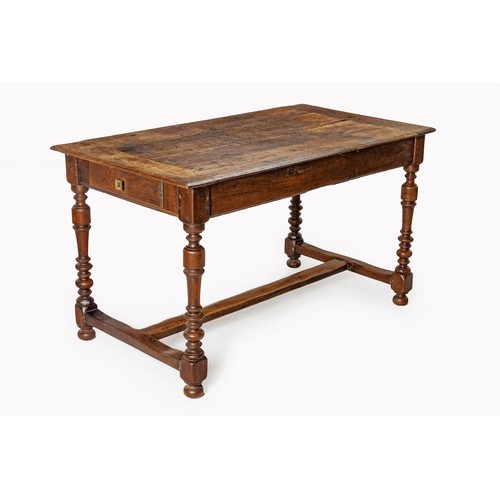 184 - AN OAK TABLE, 18TH CENTURY