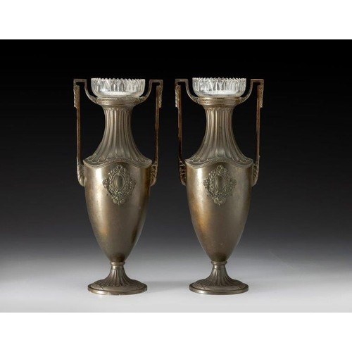 1057 - A PAIR OF NEO-CLASSICAL METAL PEDESTAL VASES