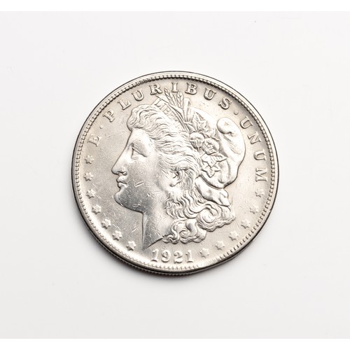 658 - A 1921 SILVER DOLLAR, UNITED STATES OF AMERICA