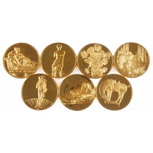 74 - A COLLECTION OF GOLD-PLATED SILVER MEDALLIONS