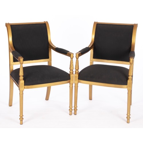 894 - A PAIR OF GILT AND UPHOLSTERED REGENCY STYLE ARMCHAIRS, MODERN