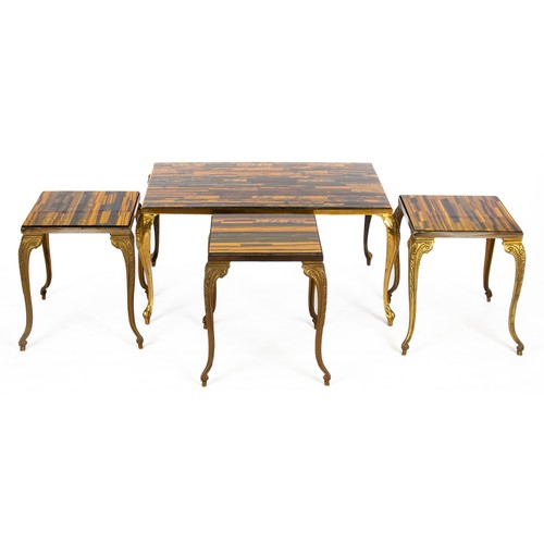 907 - A SUITE OF SIMULATED TIGER'S EYE AND BRASS COFFEE TABLES.