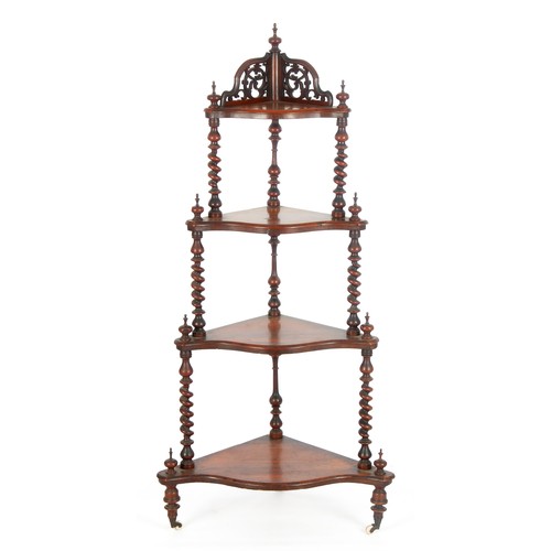 855 - A VICTORIAN FOUR-TIER WALNUT CORNER WHATNOT