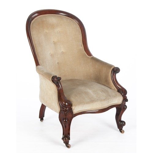 846 - A VICTORIAN WALNUT AND UPHOLSTERED ARMCHAIR