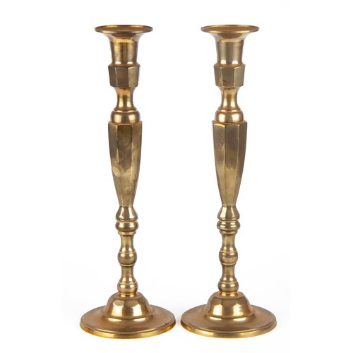 609 - A PAIR OF BRASS CANDLESTICKS