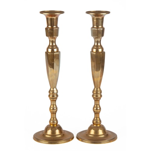 611 - A PAIR OF BRASS CANDLESTICKS