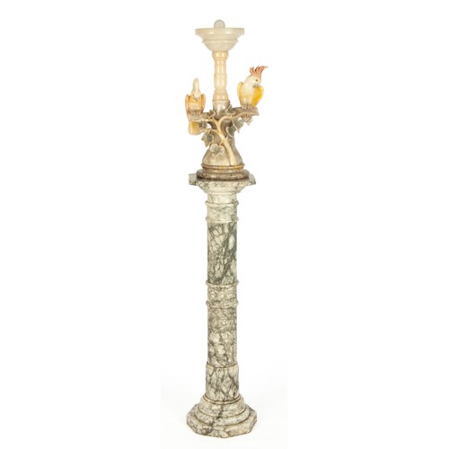 579 - A CARVED MARBLE 'PARROT' LIGHT