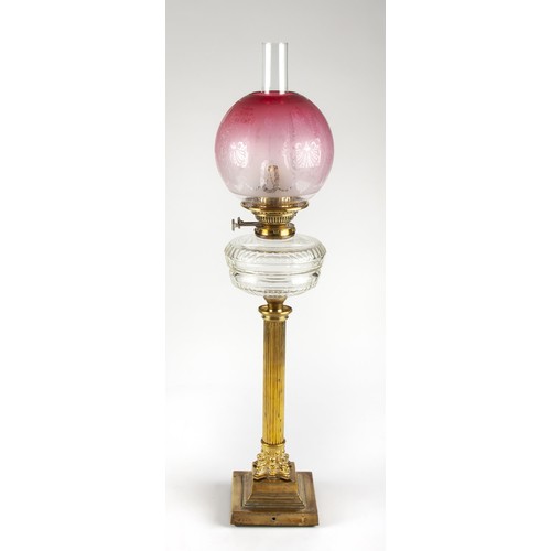 580 - A BRASS OIL TABLE LAMP