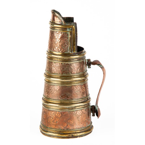 541 - A MONGOLIAN BRASS AND COPPER JUG 