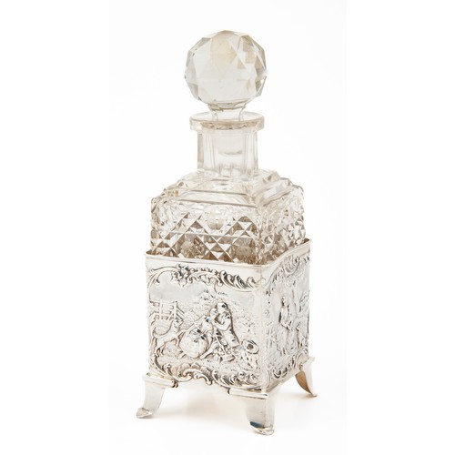 328 - A CUT GLASS DRESSING TABLE BOTTLE WITH DETACHABLE SILVER MOUNT, WILLIAM COMYNS, LONDON, 1900