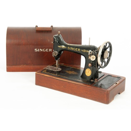 64 - A SINGER SEWING MACHINE