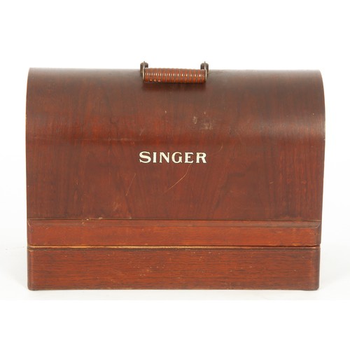 64 - A SINGER SEWING MACHINE