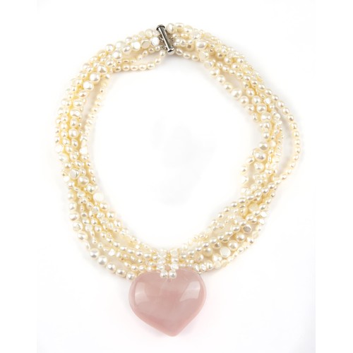 1001 - A ROSE QUARTZ PENDANT ON A STRAND OF PEARLS