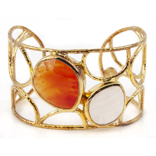 1003 - A GOLD PLATED GEM SET BANGLE