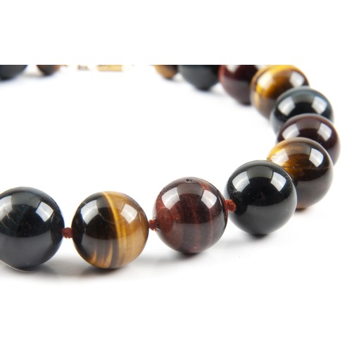 1004 - A STRAND OF TIGERS EYE