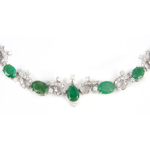 214 - AN EMERALD AND DIAMOND NECKLACE