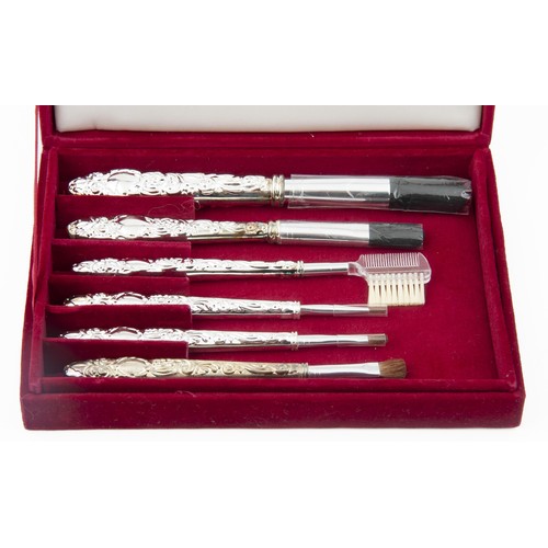 374 - A SILVER MAKE UP SET