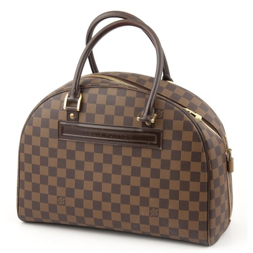 990 - A LOUIS VUITTON NOLITA HANDBAG