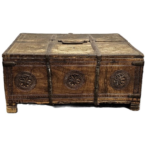 6 - A METAL-BOUND AND CARVED OAK STORAGE BOX, 19TH CENTURY