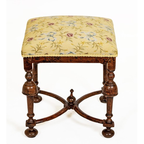 21 - AN OAK AND UPHOLSTERED STOOL, LATE 18TH CENTURY