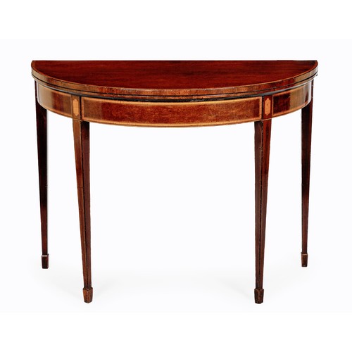 19 - A GEORGE III MAHOGANY DEMI-LUNE TABLE