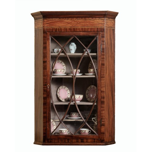 26 - A GEORGE III MAHOGANY HANGING CORNER CUPBOARD