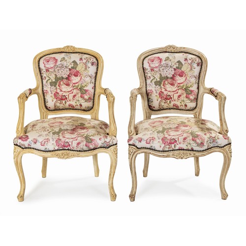 84 - A PAIR OF PAINTED AND UPHOLSTERED ARMCHAIRS