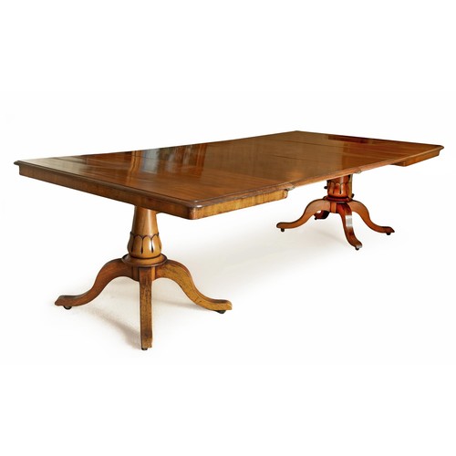 47 - A GEORGE III MAHOGANY EXTENDING DINING TABLE