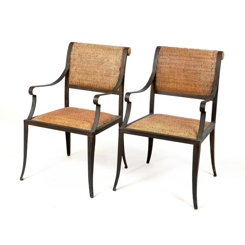 97 - A PAIR OF IRON PATIO CHAIRS