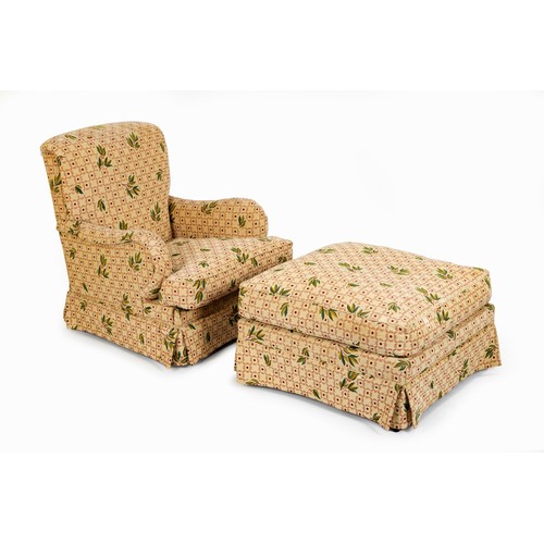 65 - AN UPHOLSTERED EASY CHAIR AND OTTOMAN, MODERN