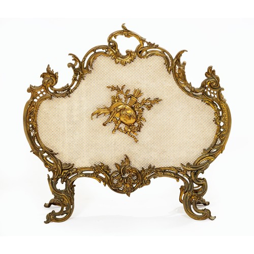 24 - A GILT METAL FIRESCREEN, MODERN